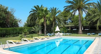 Chalet located on a wooded park of 8000m ² with large community pool, .