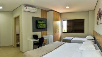 Family Room, Multiple Beds | Minibar, desk, laptop workspace, free WiFi
