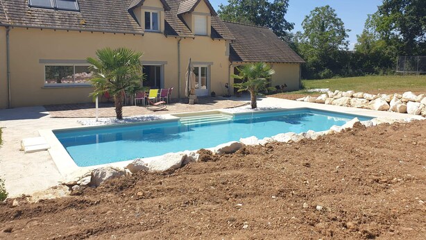 A house with a swimming pool, patio furniture, and a lawn. - Villa with private pool and jacuzzi, lovely view (Herry)