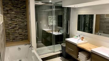 Bathtub, hair dryer, towels, soap