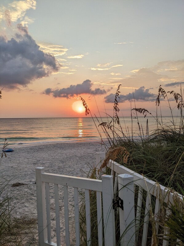 On the beach, sun loungers, beach towels