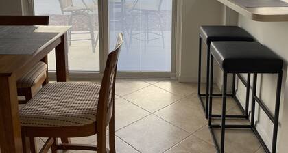 Courtyard Villa with gas golf cart located between two Town Squares!