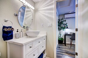 Combined shower/tub, hair dryer, towels, soap