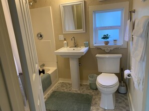 A bathroom with a sink, toilet, and shower. - Blue Mist Victorian 5bed/2bath Victorian Gem (Eureka)