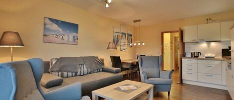 Una televisión, un reproductor de DVD, un reproductor estéreo