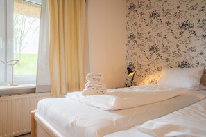 2 bedrooms, travel crib, WiFi, bed sheets