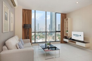 Habitación Deluxe, 1 habitación | Caja de seguridad en la habitación y tabla de planchar con plancha