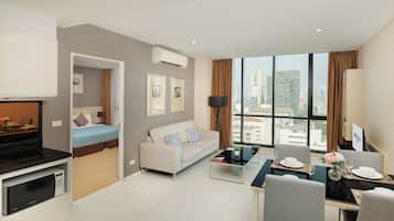 Deluxe Room, 1 Bedroom | 1 bedroom, in-room safe, iron/ironing board, bed sheets