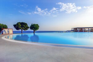 Indoor pool, pool umbrellas, sun loungers