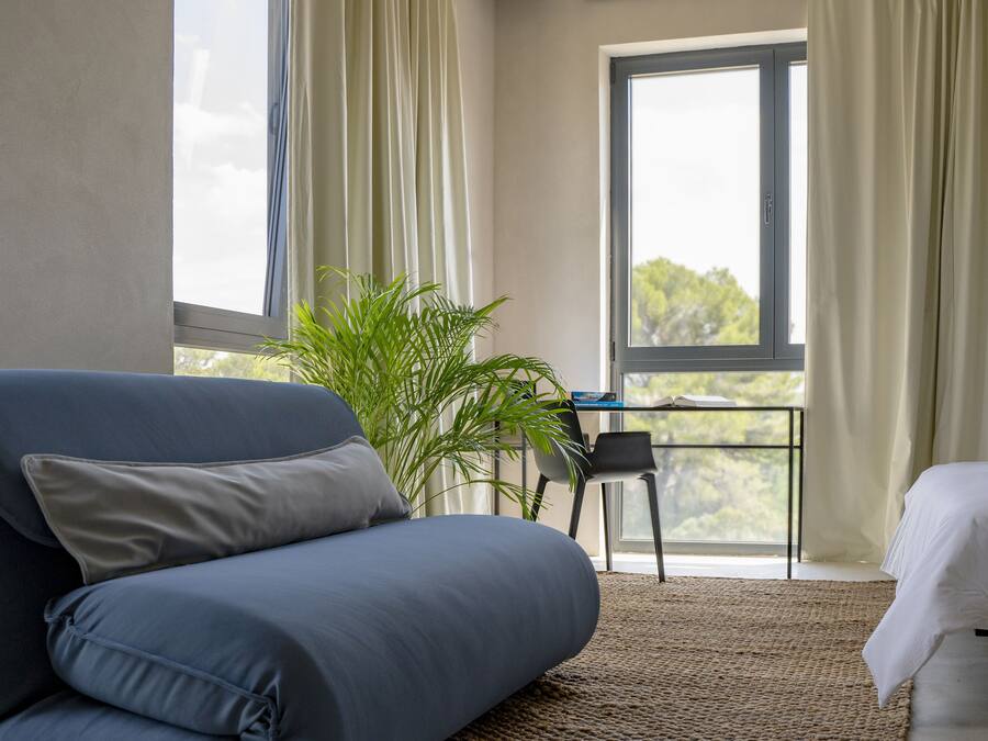 Deluxe Room, Multiple Beds | Living area | 55-cm flat-screen TV with cable channels, TV