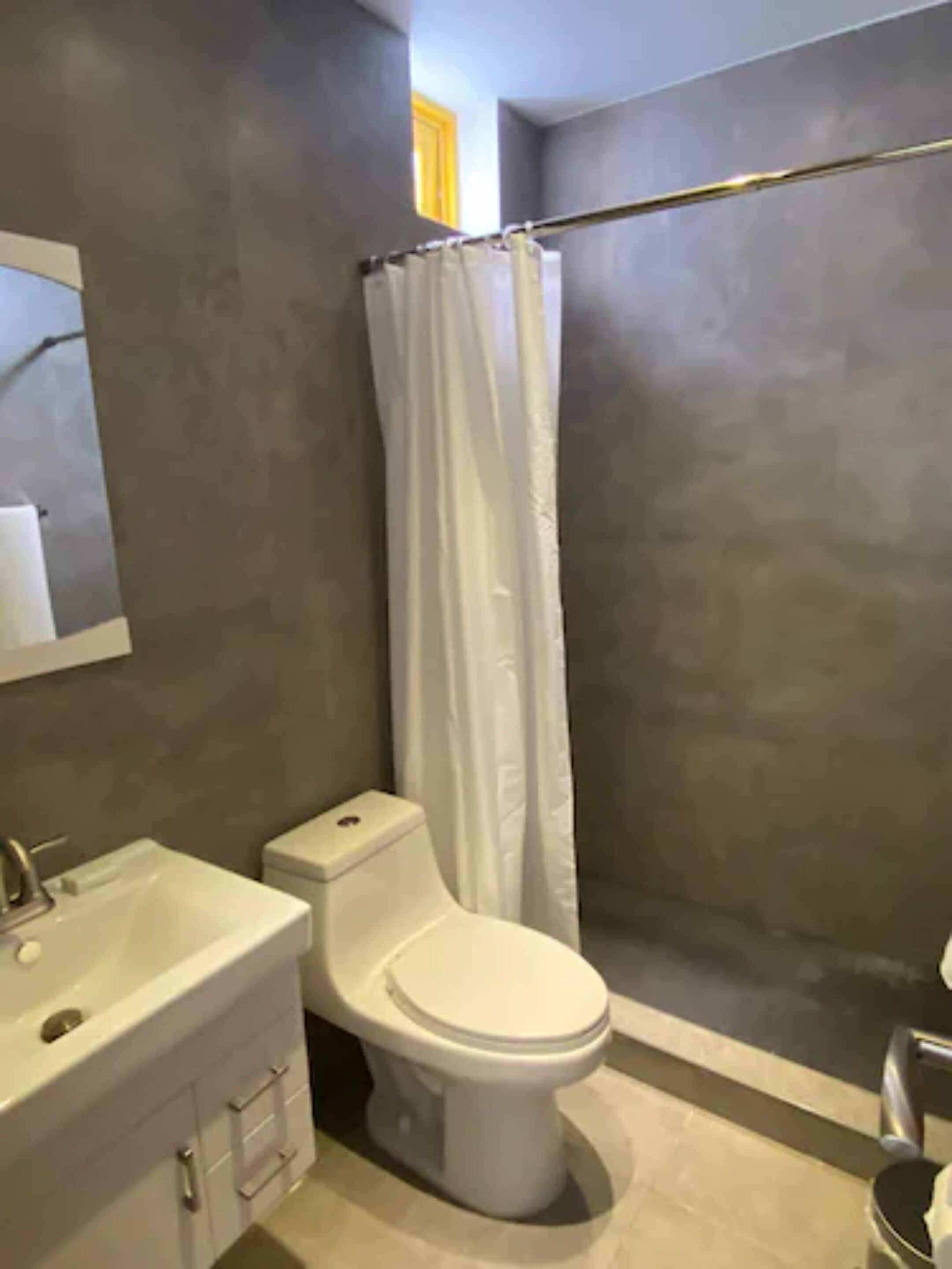 basic single room | bathroom | shower, hair dryer, towels