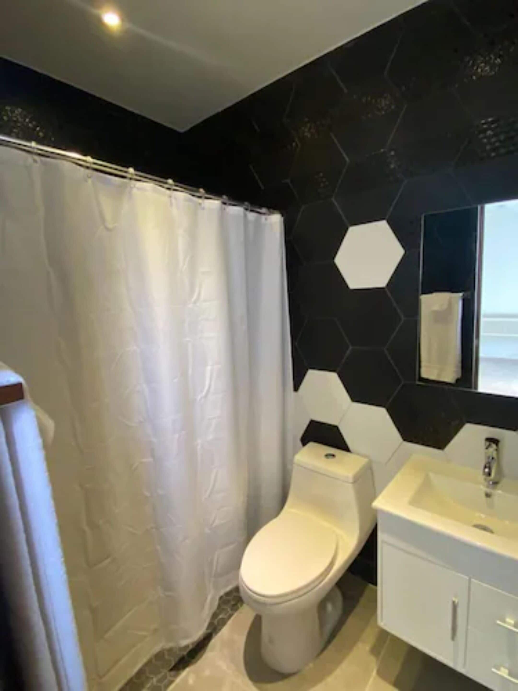 standard single room | bathroom | shower, hair dryer, towels