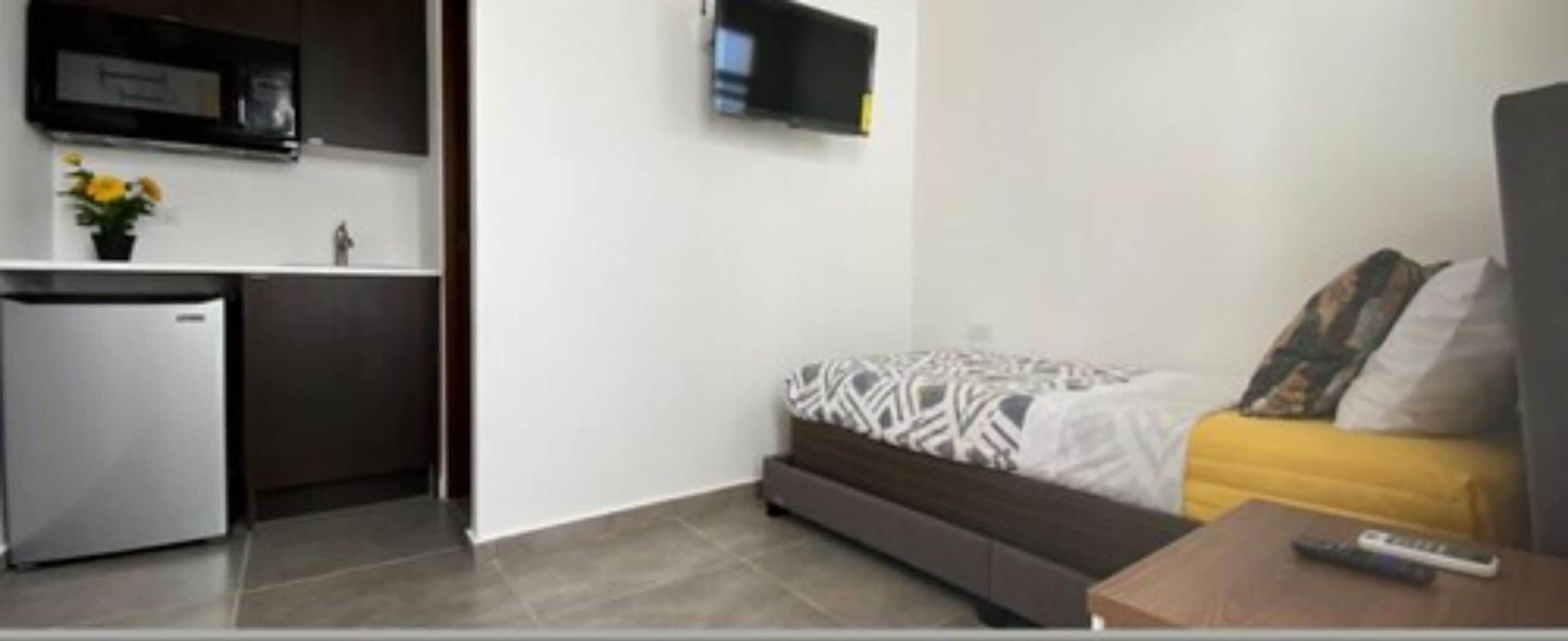 economy single room | individually decorated, laptop workspace, blackout curtains