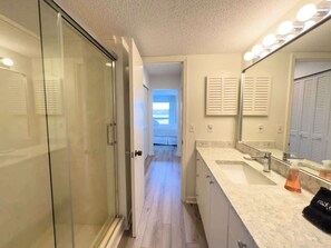 Combined shower/tub, hair dryer