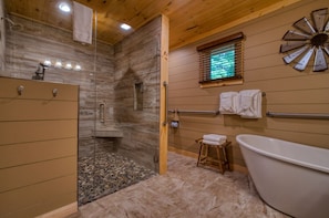 Combined shower/tub, hair dryer, towels, soap