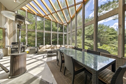 Blue Chalet located at Talan lake on 7 acer of forest and land with Private dock