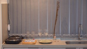 Basic Studio Suite | Private kitchen - Bauten 211 Cabo Branco por Carpediem (João Pessoa)