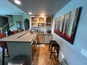 Fridge, microwave, dishwasher, coffee/tea maker