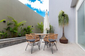 Apartamento | Restaurante al aire libre
