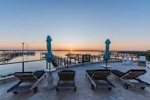 Terrace/patio - Waterfront home with dock, heated pool, & spectacular views- walk/bike downtown! (St. Augustine)