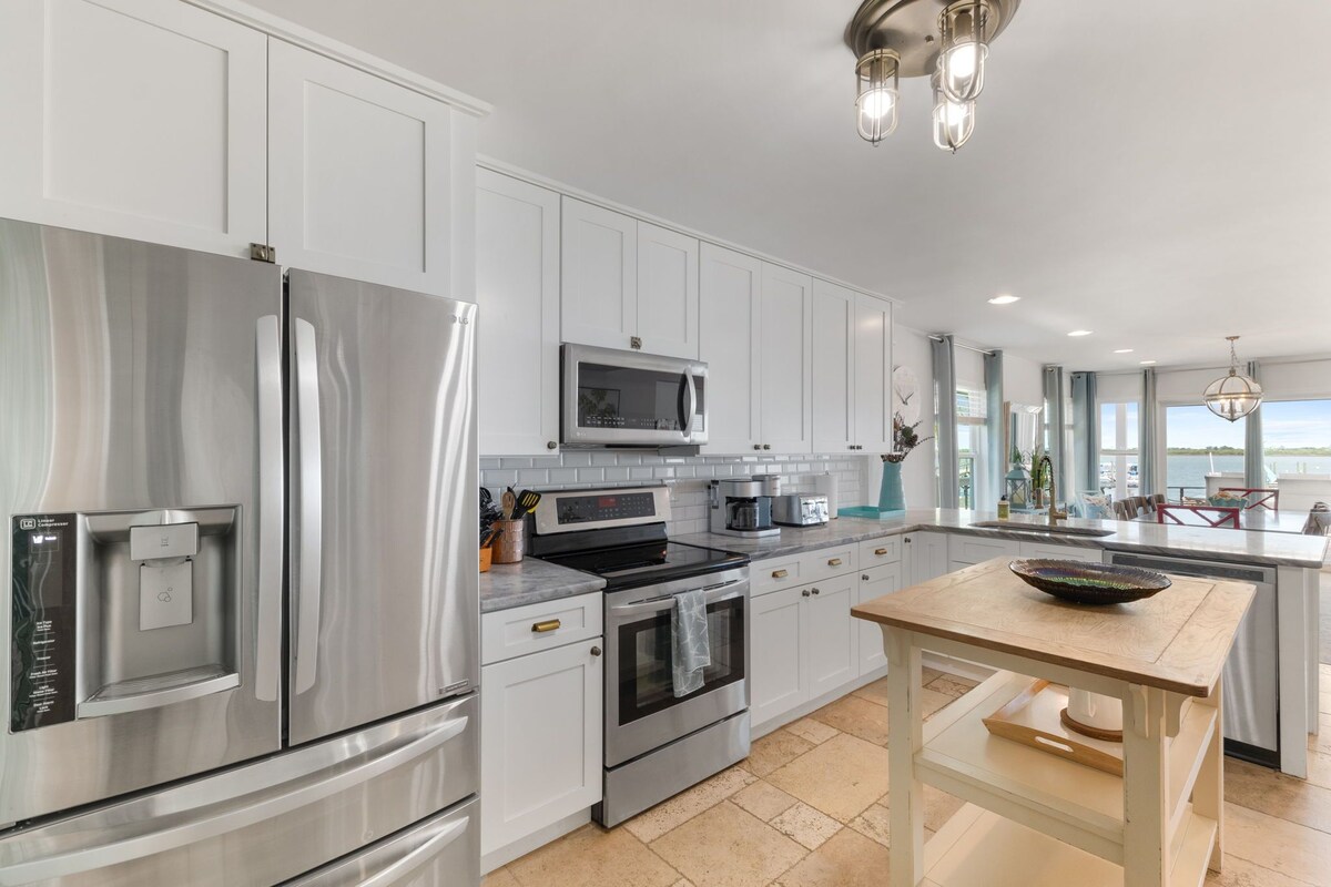 Photo 17 of Waterfront home with dock, heated pool, & spectacular views- walk/bike downtown!