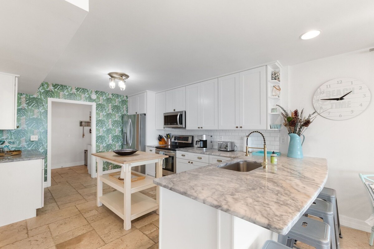 Photo 16 of Waterfront home with dock, heated pool, & spectacular views- walk/bike downtown!