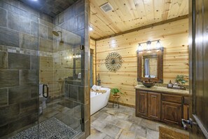 Bathtub, hair dryer, towels, soap