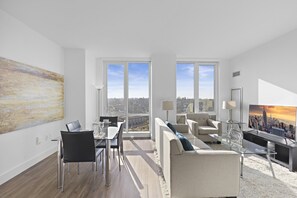 Luxury Apartment, 2 Bedrooms, 2 Bathrooms | Living area | 50-inch LCD TV with cable channels, TV - Global Luxury Suites White Plains (White Plains)