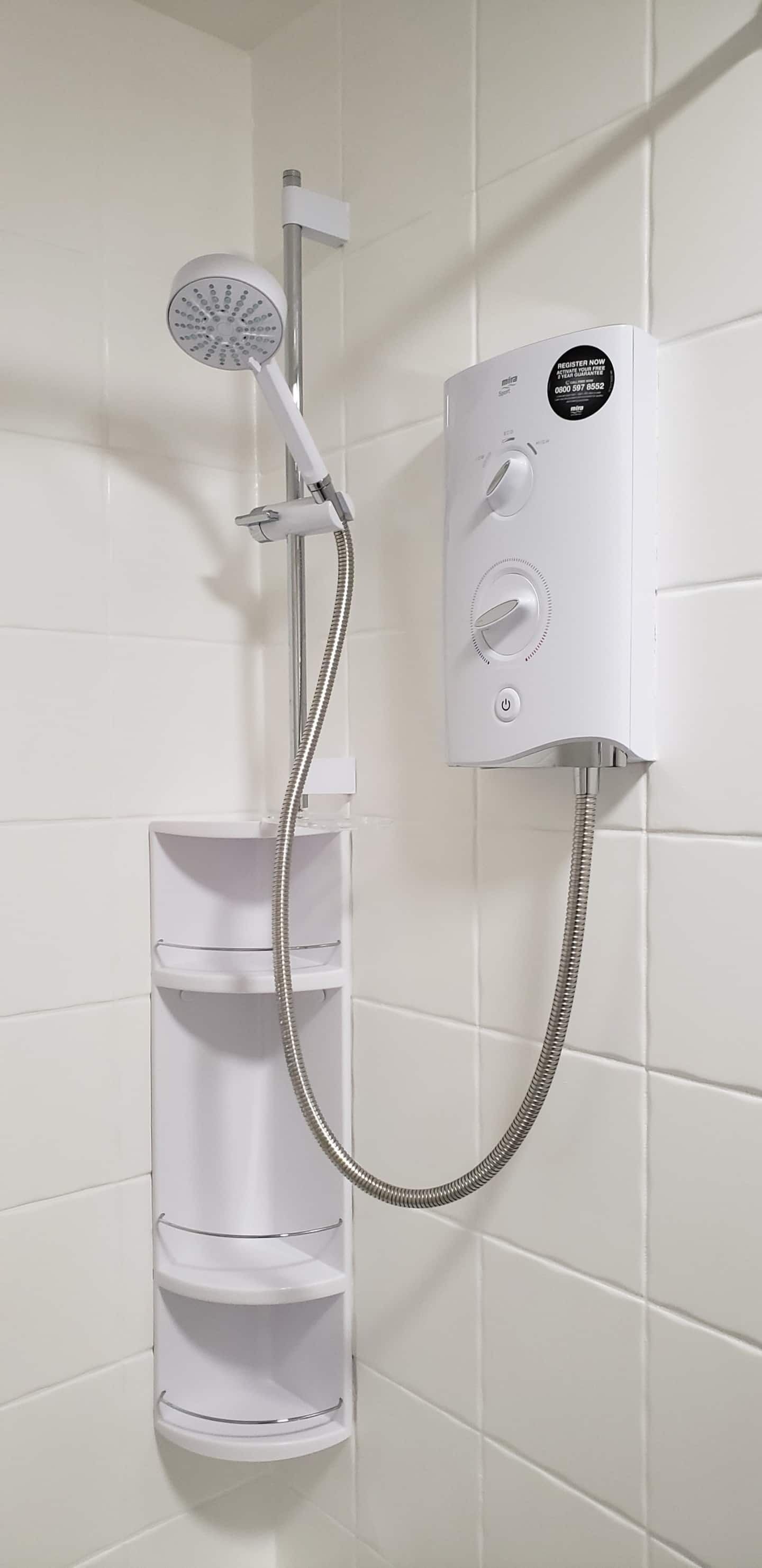 Combined shower/bathtub, hair dryer, towels, soap