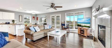 Televisión, chimenea, videojuegos y videoteca