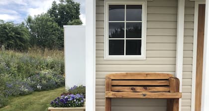 Beautiful Tiny House with communal water hole.
