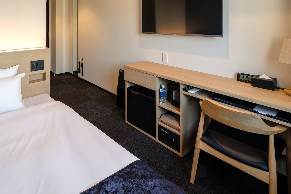 Desk, blackout curtains, free WiFi, bed sheets