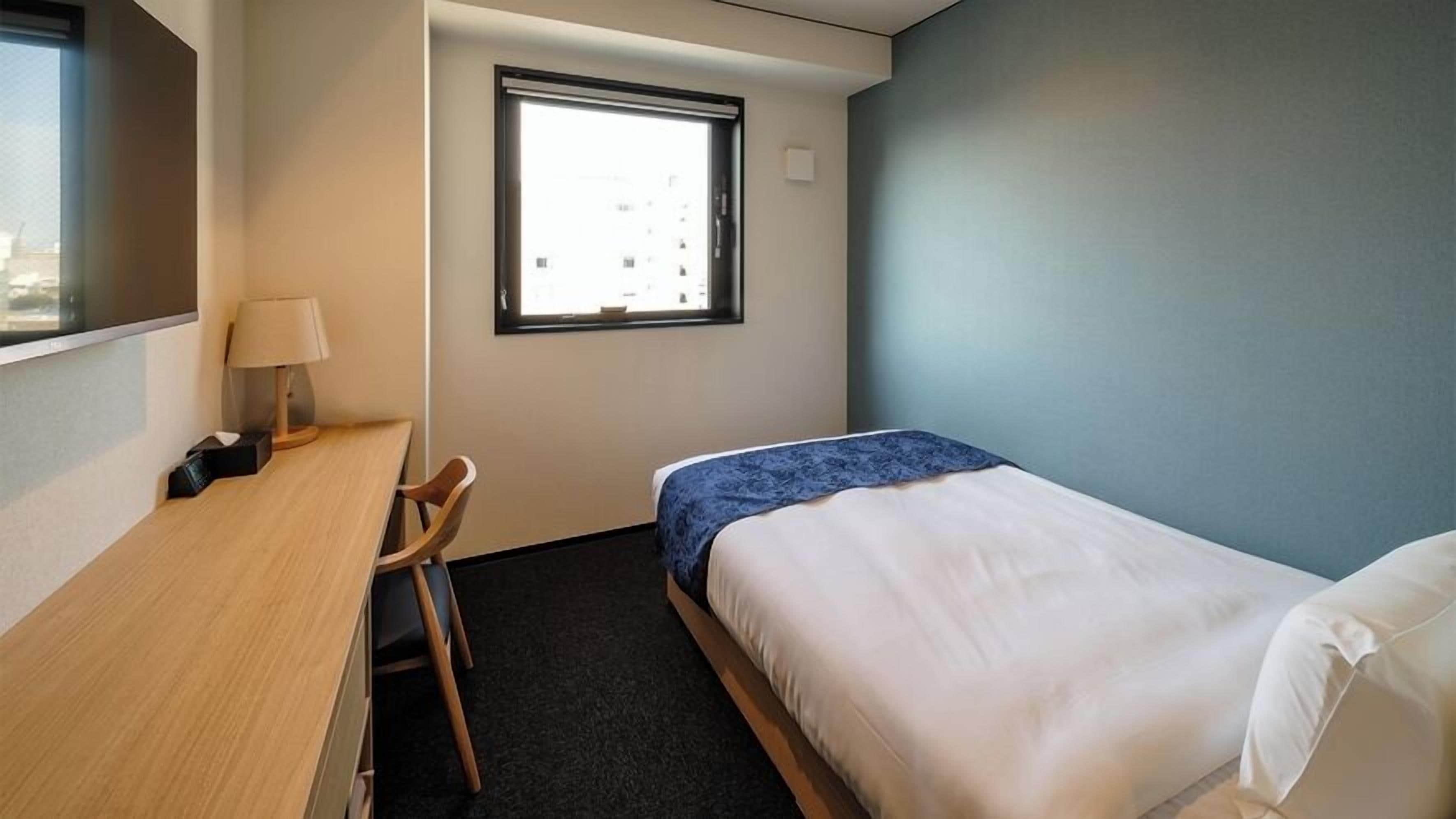 Desk, blackout drapes, free WiFi, bed sheets