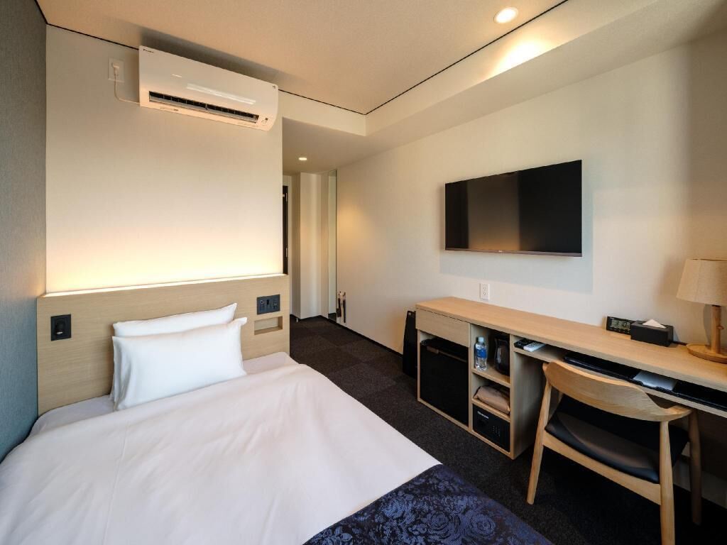 Desk, blackout drapes, free WiFi, bed sheets