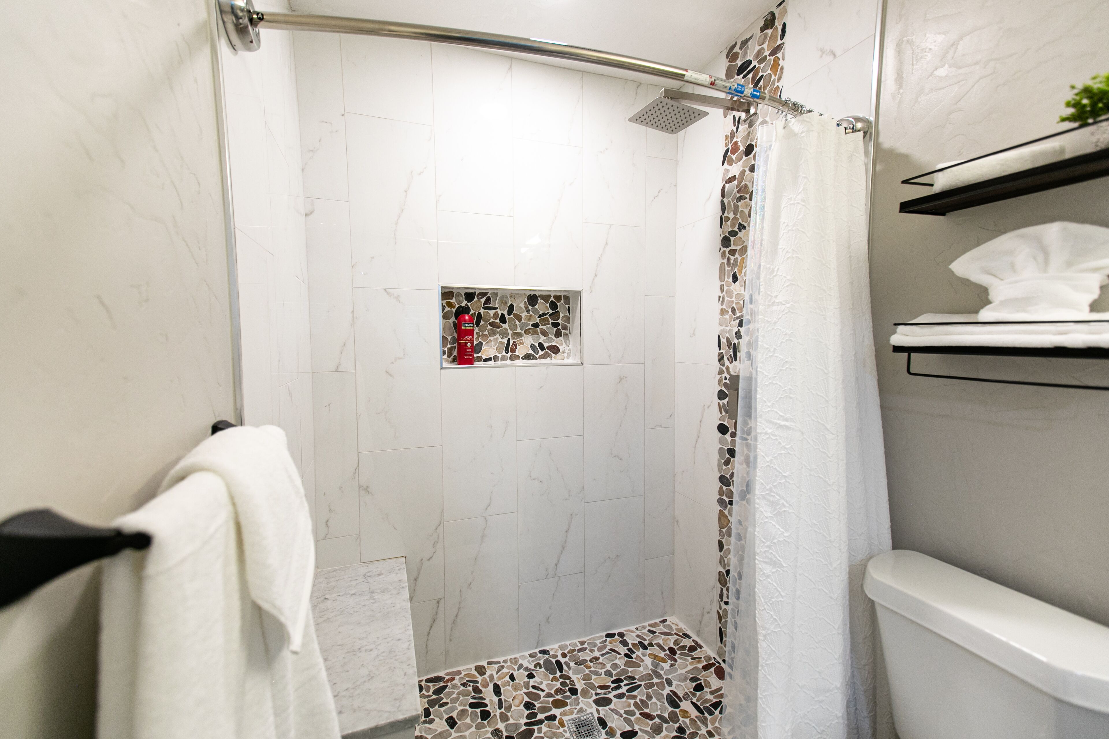 Shower, towels, soap, shampoo