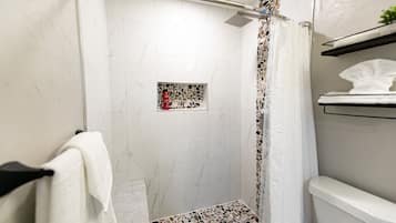 Shower, towels, soap, shampoo