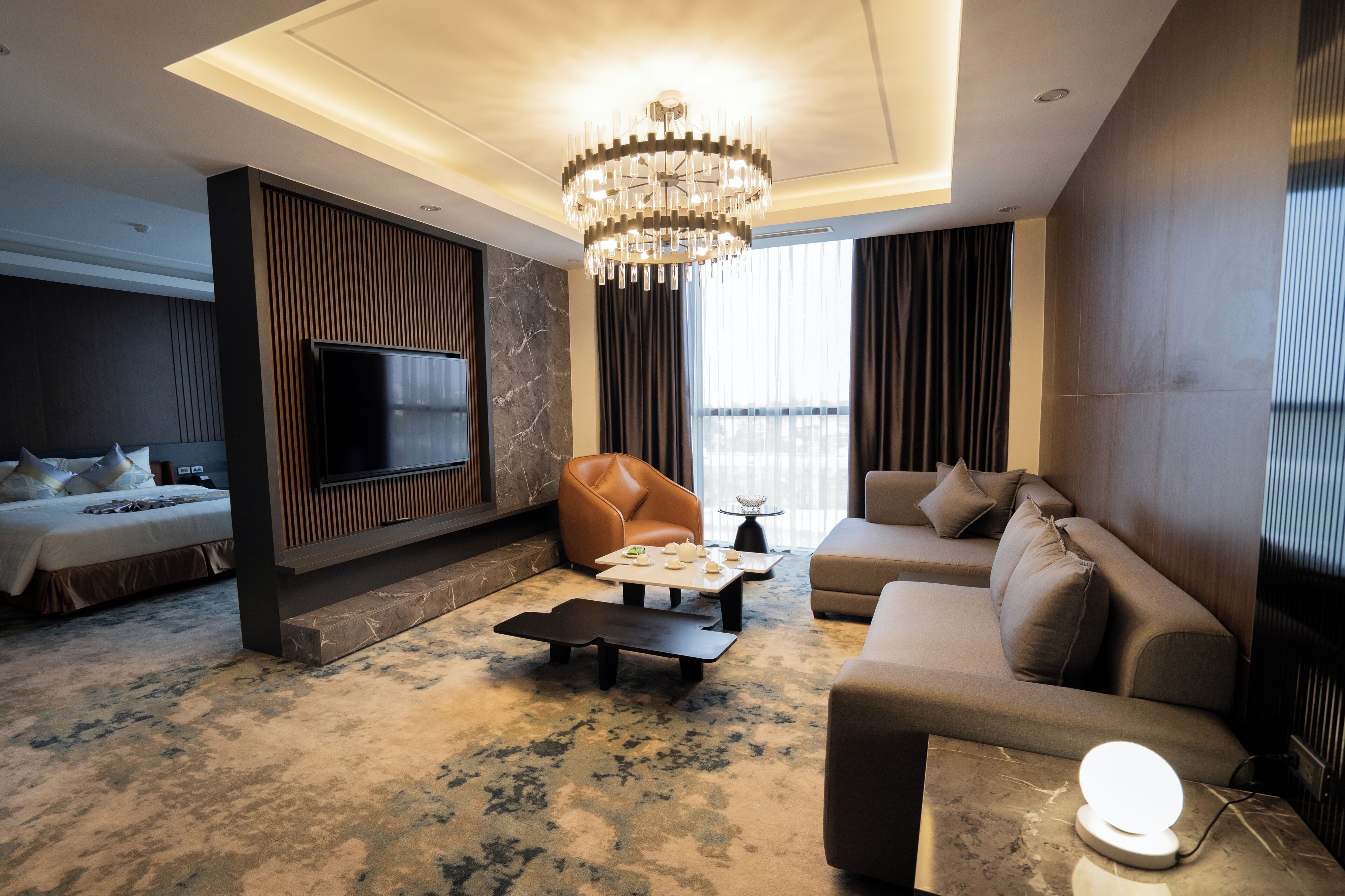 Grand Room, 1 King Bed, River View | Living area | 42-inch Smart TV with cable channels, TV