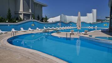 2 indoor pools, seasonal outdoor pool, pool umbrellas, pool loungers
