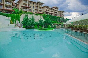 2 indoor pools, seasonal outdoor pool, pool umbrellas, pool loungers