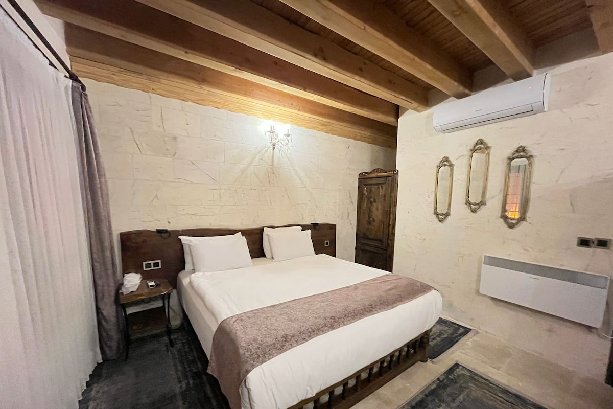 Egyptian cotton sheets, premium bedding, down duvets, memory-foam beds