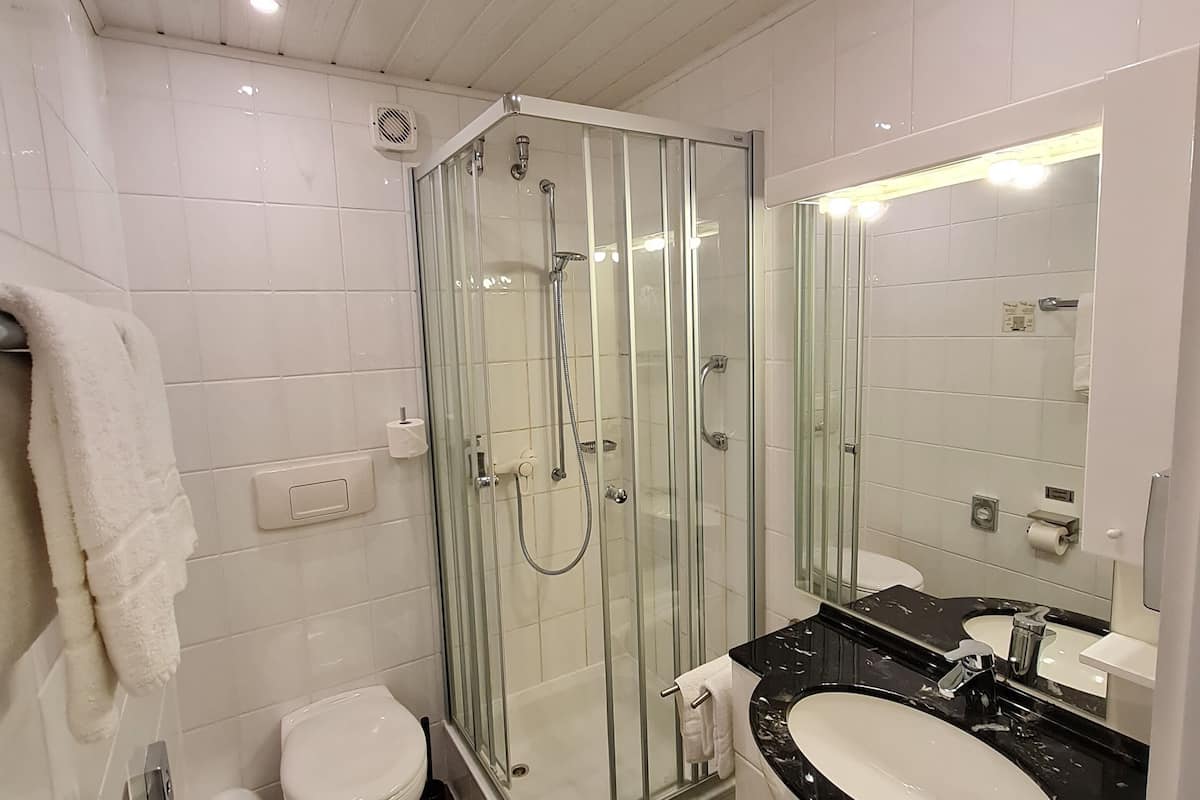 family room | bathroom | hair dryer, towels, soap, shampoo