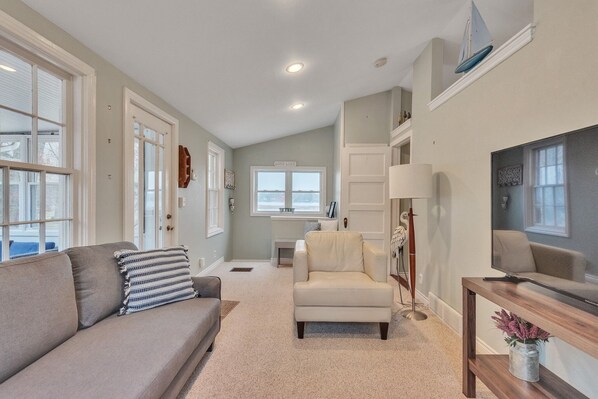 House, 2 Bedrooms | Living area | Smart TV - Amazing Lakefront Retreat On Long Lake! 2 Bedroom Home by RedAwning (Kalamazoo)