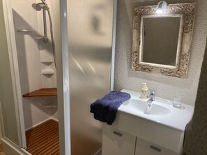 Combined shower/tub, hair dryer, towels, toilet paper