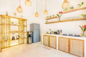 Fridge, microwave, stovetop, coffee/tea maker