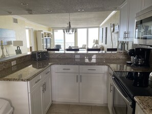 Fridge, microwave, oven, stovetop - Oceanfront, non-drive beach, heated pool, sport courts, gym (Daytona Beach Shores)
