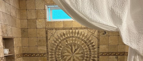 Combined shower/tub, hair dryer, towels, soap