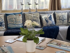 Chalet, Multiple Beds | Living area | 30-inch TV with digital channels