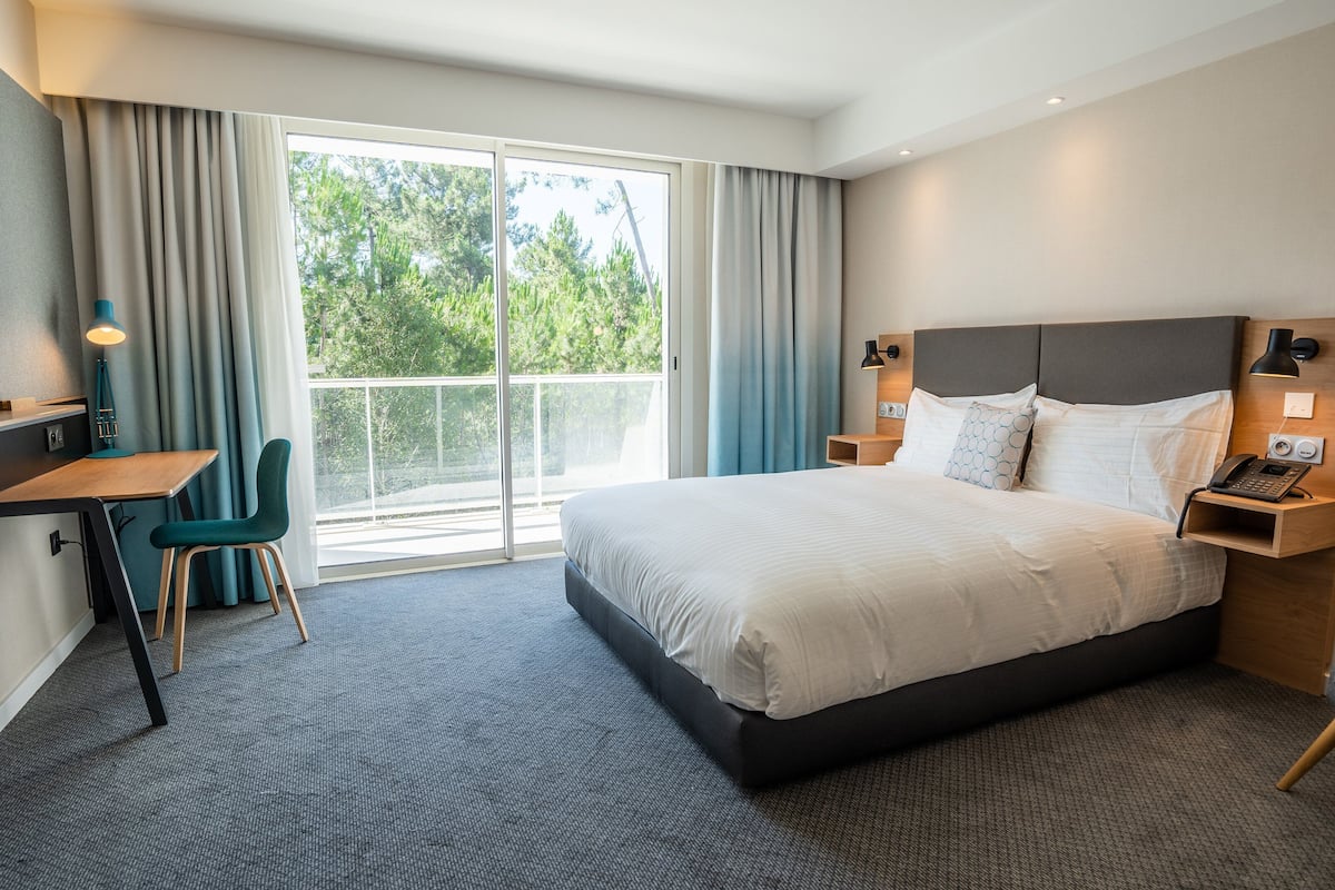 In-room safe, individually furnished, desk, blackout curtains