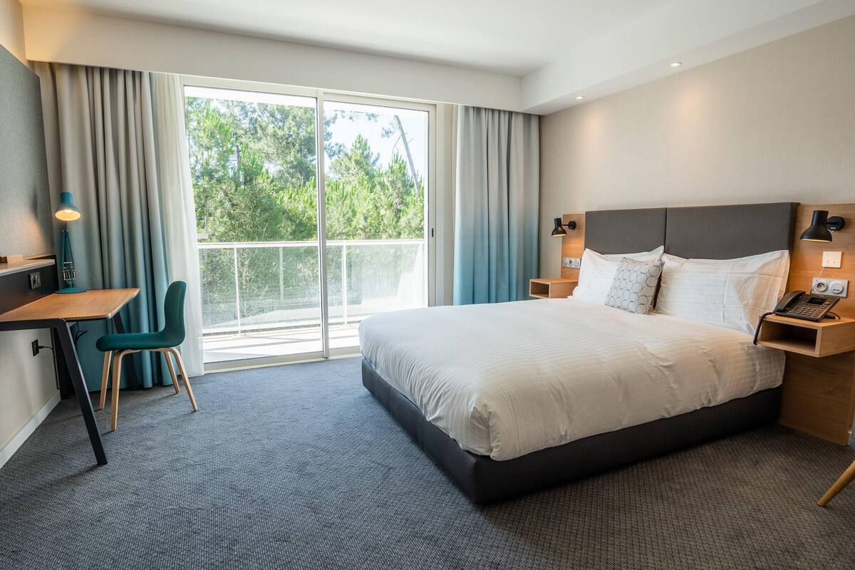 In-room safe, desk, laptop workspace, blackout curtains