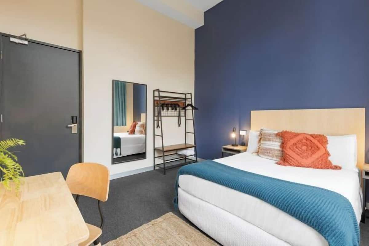 1 bedroom, blackout drapes, soundproofing, bed sheets